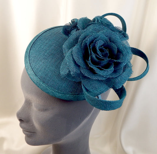 Teal hat with flower detail