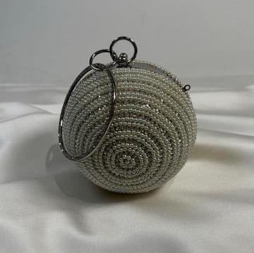 Round bag with diamonds and pearls