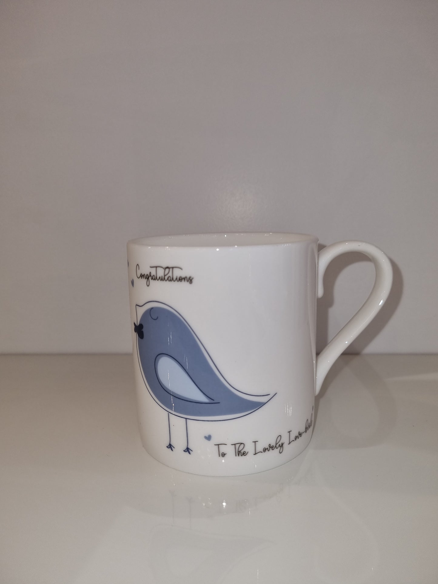 Congratulations to the love birds fine china mug in Pink