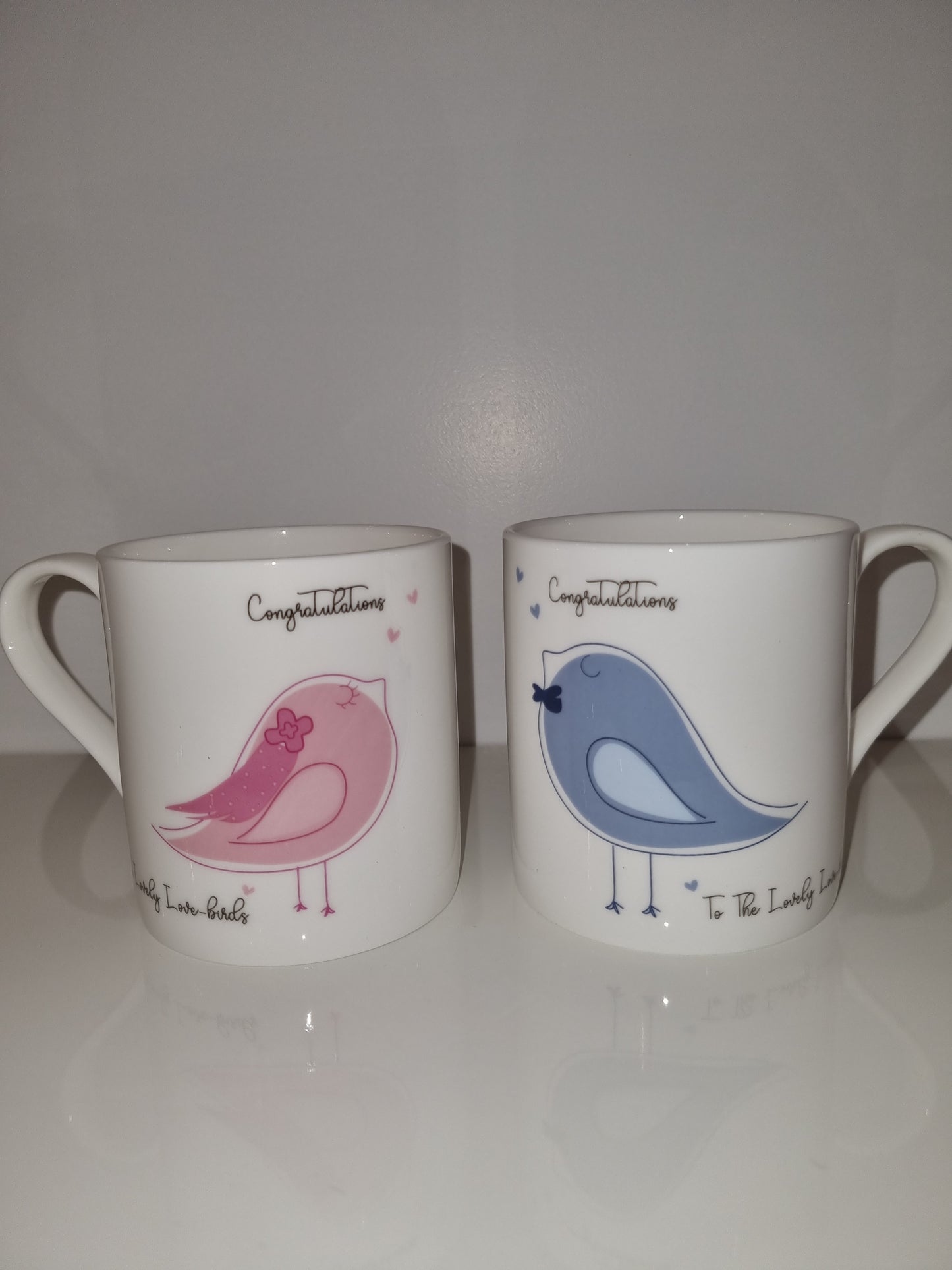 Congratulations to the love birds fine china mug in Pink